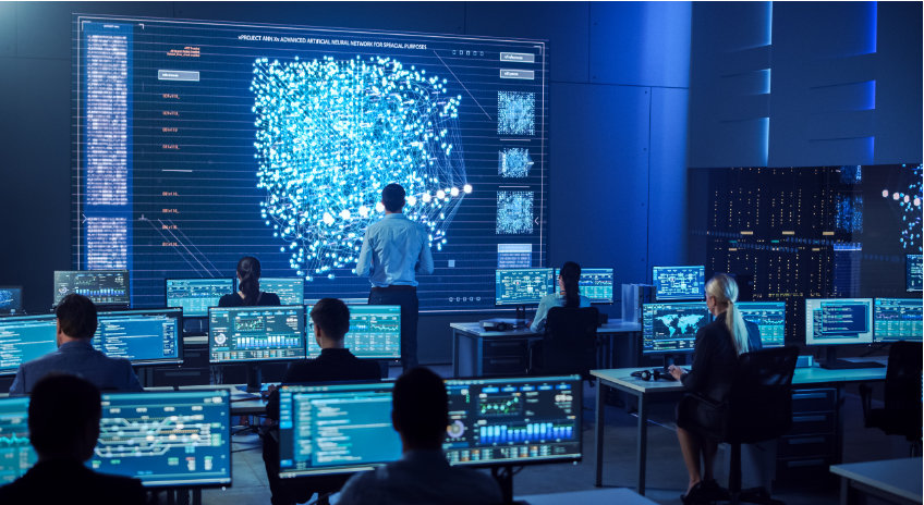 Democracy and State Secrets Technical room with numerous computers and people in front of them